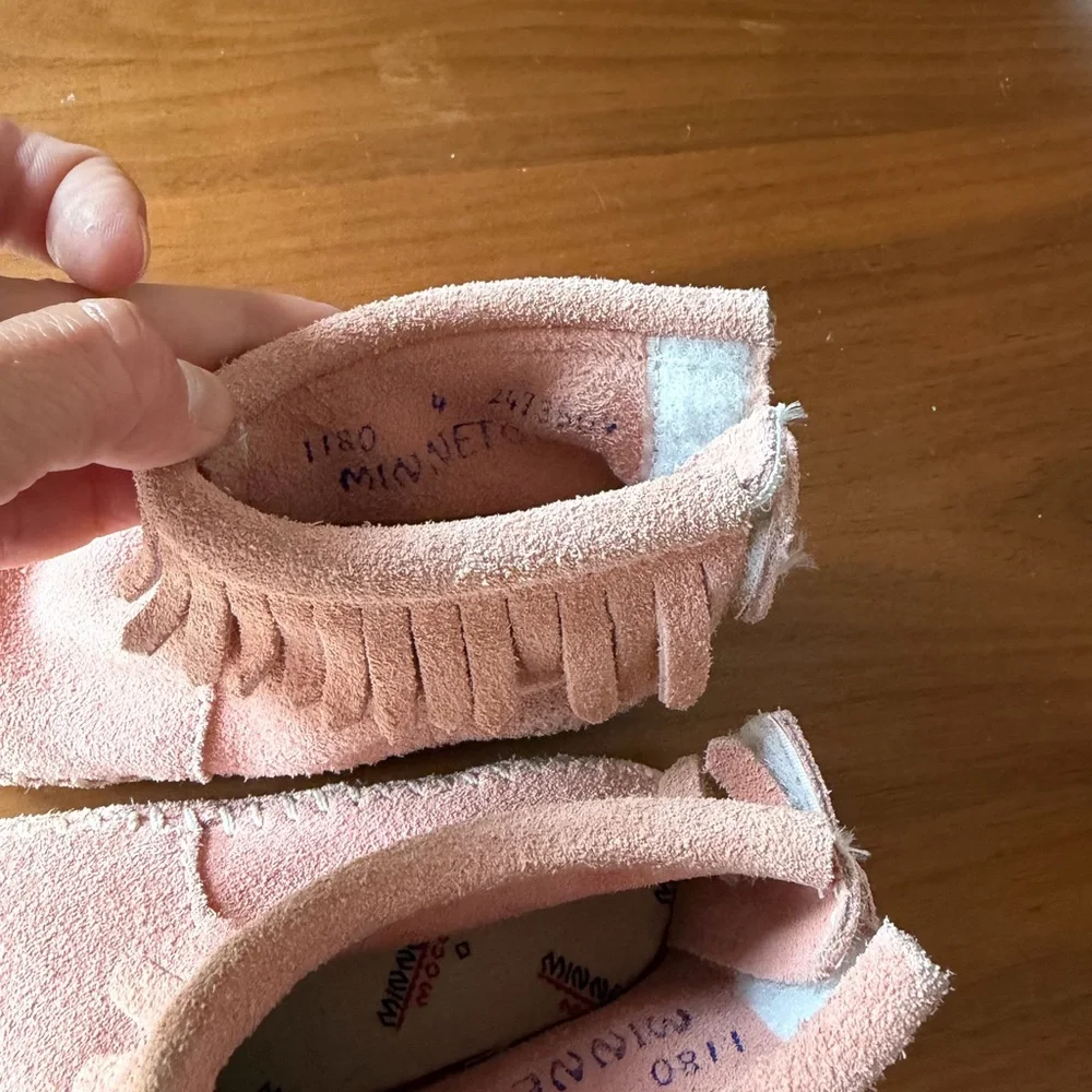 Minnetonka Kids Suede Fringe Moccasins in Light Pink